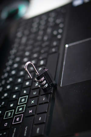 Number Padlock on Black keyboard. Internet security Breach conceptの写真素材