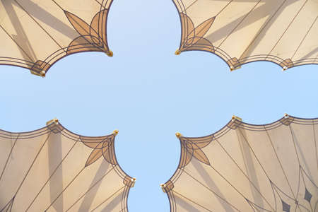 Big umbrella structure of al masjid al nabawi from the holy land and beautiful building structure madinah saudi arabiaの写真素材