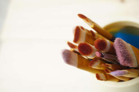 Make up brushes in wooden box. Copy Space Conceptの写真素材