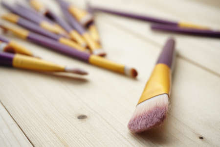 Close up Make Up Brush. Fashion cosmetic makeup autumn Set. Trendy Brushes, art fashionable layout. Creative Design Flat lay, make up fall autumnal conceptの写真素材