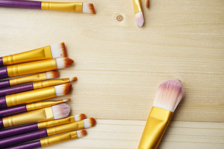 Close up Make Up Brush. Fashion cosmetic makeup autumn Set. Trendy Brushes, art fashionable layout. Creative Design Flat lay, make up fall autumnal conceptの写真素材