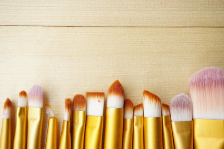 Close up Make Up Brush. Fashion cosmetic makeup autumn Set. Trendy Brushes, art fashionable layout. Creative Design Flat lay, make up fall autumnal conceptの写真素材