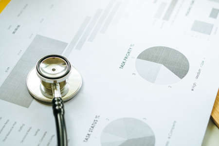 Close up a calculator over yellow background. Financial Calculation Concept.の写真素材