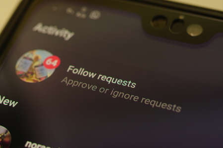 Kuala Lumpur, Malaysia, 24th July 2020: Close up Instagram application menu on smartphone screen. Instagram is a photo and video-sharing social networking service owned by Facebook.のeditorial素材