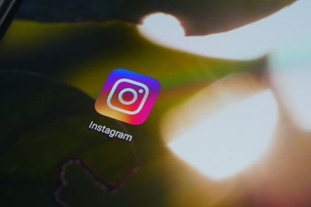 Kuala Lumpur, Malaysia, 24th July 2020: Close up Instagram application menu on smartphone screen. Instagram is a photo and video-sharing social networking service owned by Facebook.のeditorial素材