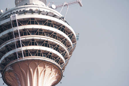 KUALA LUMPUR, MALAYSIA - January 28 2016 : KL Tower over a cloudy sky background.The second tallest tower in the country with its height of 421 m. It stands on a hill in the city center.のeditorial素材