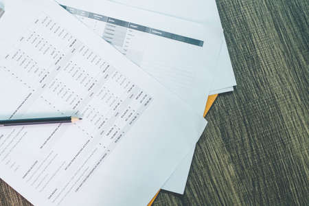 Spreadsheet table paper with pencil. Finance development, Banking Account, Statistics Investment Analytic research data economy, trading, Mobile office reporting Business company meeting concept.の写真素材