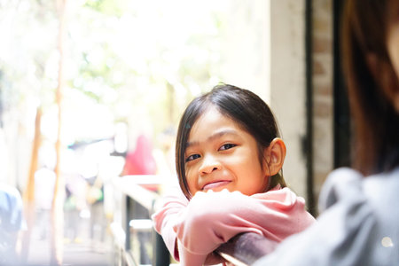 Close-up portrait of cute little girl. Attractive lovely sweet curious cheerful cheery smart clever...
