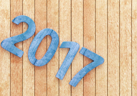 2017 New year wooden digits on wooden planks. 3d rendering
