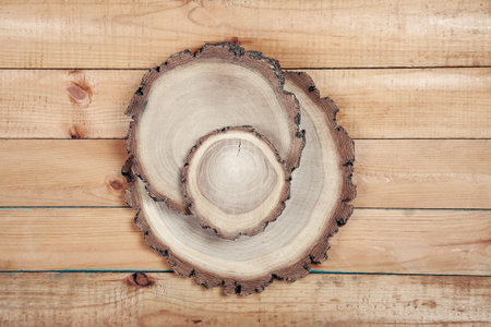 Round three boards on old wooden table