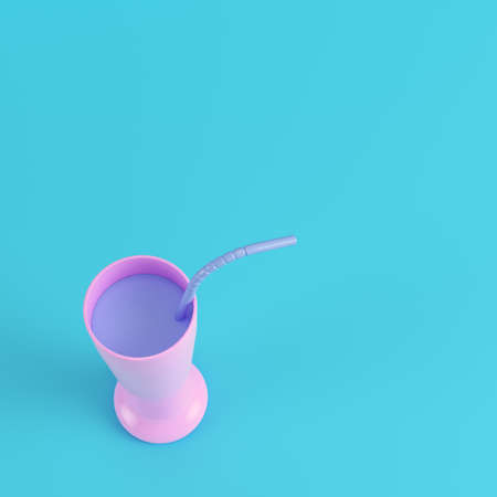Cocktail glass with straw on bright blue background in pastel colors. Minimalism concept. 3d renderの写真素材