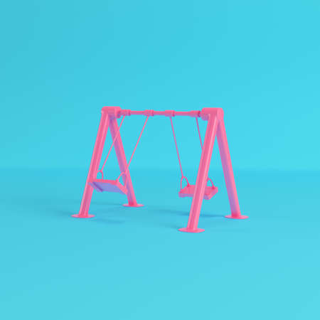 Red children swing on bright blue background in pastel colors. Minimalism concept. 3d renderingの写真素材