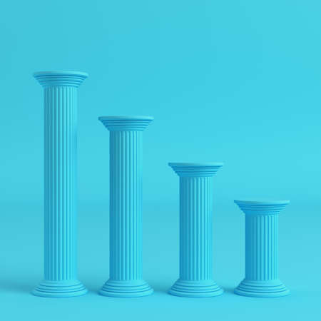 Four ancient pillars on bright blue background in pastel colors. Minimalism concept. 3d renderの写真素材