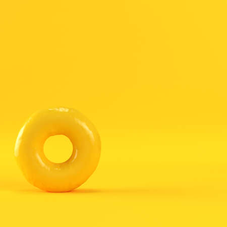 Donut on yellow background with copy space. 3d renderの写真素材