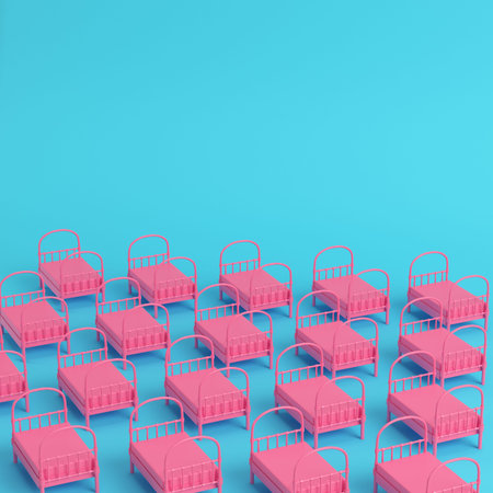 Pink single beds on bright blue background in pastel colors. Minimalism concept. 3d render