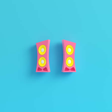 Pink cartoon-styled speaker on bright blue background in pastel colors. Minimalism concept. 3d renderの写真素材