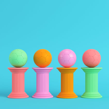 Four colorful columns with soccer ball on bright blue background in pastel colors. Minimalism...