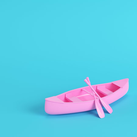 Pink canoe with paddles on bright blue background in pastel colors. Minimalism concept. 3d renderの写真素材