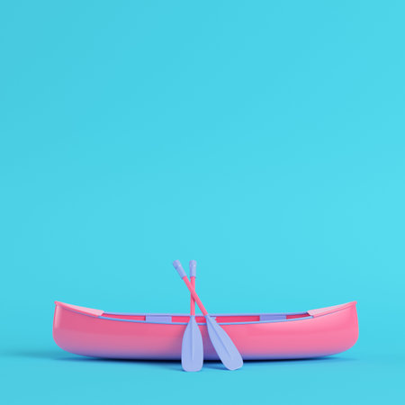 Pink canoe with paddles on bright blue background in pastel colors. Minimalism concept. 3d renderの写真素材