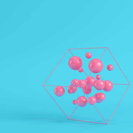 Abstract spheres in wire box on bright blue background in pastel colors. Minimalism concept. 3d renderの写真素材