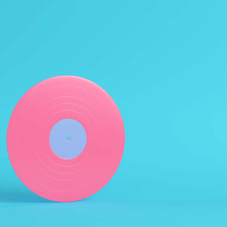 Vinyl record on bright blue background in pastel colors. Minimalism concept. 3d renderの写真素材