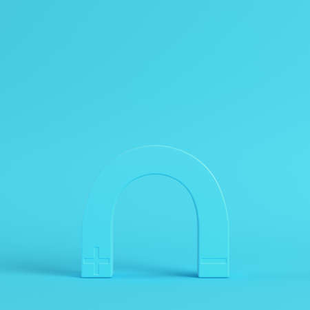 Magnet on bright blue background in pastel colors. Minimalism concept. 3d renderの写真素材