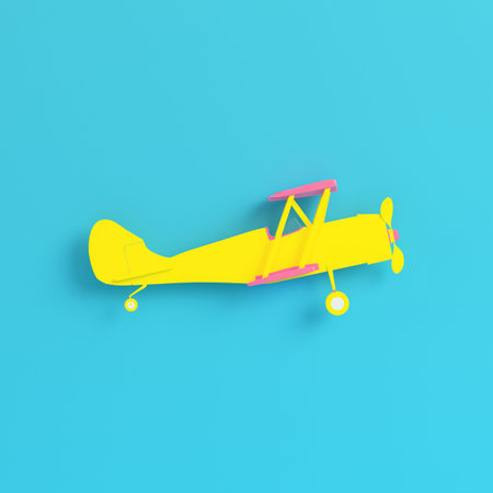 Yellow biplane on bright blue background in pastel colors. Minimalism concept. 3d render