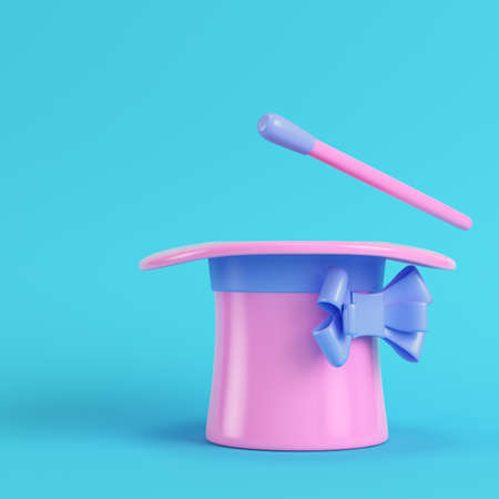 Top hat and magic wand on bright blue background in pastel colors. Minimalism concept. 3d renderの写真素材