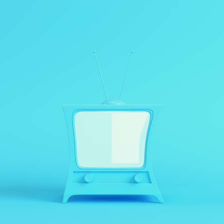 Cartoon styled tv on bright blue background in pastel colors. Minimalism concept. 3d renderの写真素材