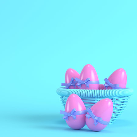 Pink easter eggs with bow in a wicker basket on bright blue background in pastel colors. Minimalism concept. 3d renderの写真素材