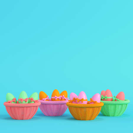 Colorful easter eggs with bow in a wicker basket on bright blue background in pastel colors. Minimalism concept. 3d renderの写真素材
