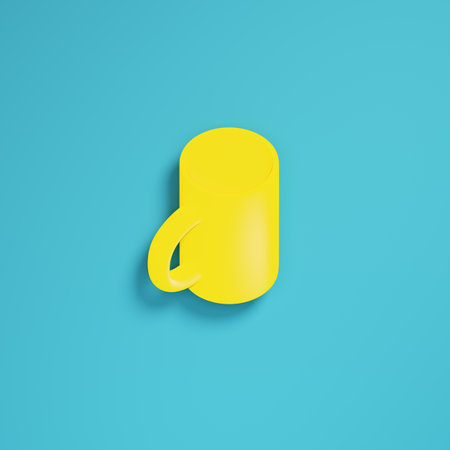 Yellow coffee mug on bright blue background in pastel colors. Minimalism concept. 3d renderの写真素材