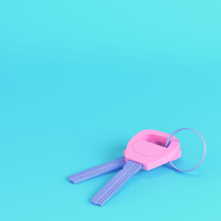 Yellow two keys on keyring on bright blue background in pastel colors. Minimalism concept. 3d render