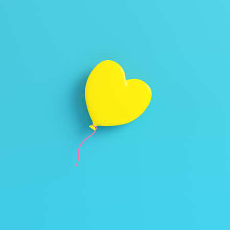 Yellow drum with drum sticks on bright blue background in pastel colors. Minimalism concept. 3d renderの写真素材