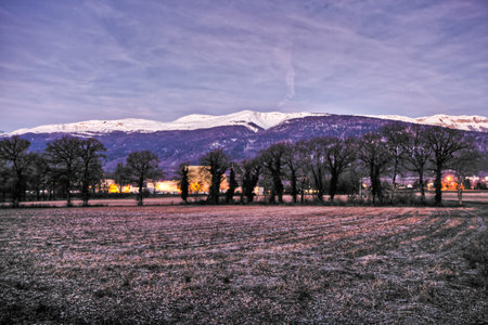 Jura mountain range in winter at dawn. Picture was teken near Swiss and French border near the...