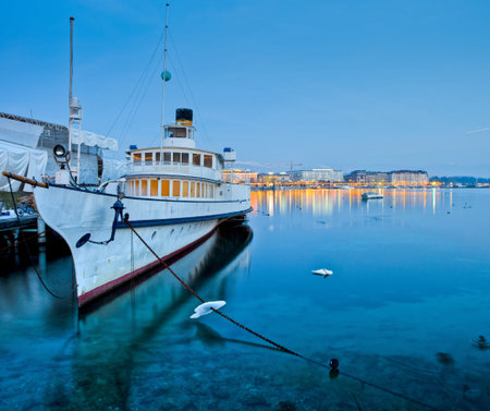 Tourist cruise ship at a marina at Lake Geneva, Switzerlandの写真素材