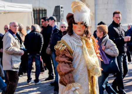 Annecy, France - March 3rd, 2012. Masked participant at the annual Annecy Venetian Festivalのeditorial素材