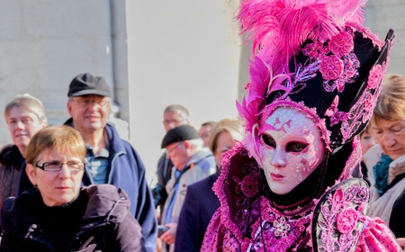 Annecy, France - March 3rd, 2012. Masked participant at the annual Annecy Venetian Festivalのeditorial素材