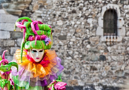 Annecy, France - March 3rd, 2012. Masked participant at the annual Annecy Venetian Festivalのeditorial素材