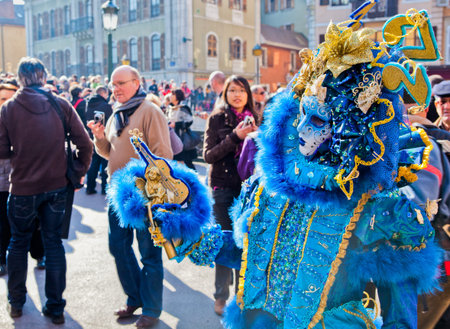 Annecy, France - March 3rd, 2012. Masked participant at the annual Annecy Venetian Festivalのeditorial素材