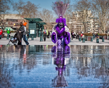 Annecy, France - March 3rd, 2012. Masked participant at the annual Annecy Venetian Festival のeditorial素材