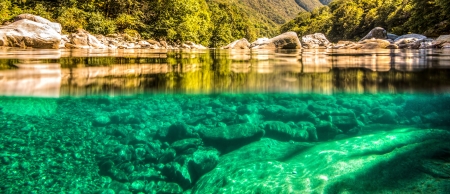 Half submerged view of the landscape and Verzasca river at  Lavertezzo, Verzasca Valley, Ticino, Switzerlandの写真素材