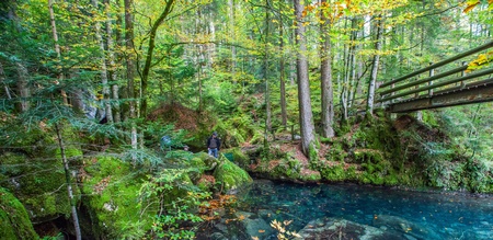 Blausee, Switzerland, October 6th, 2012.  Tourists enjoying the view of the crystal clear lake at Blausee, Switzerland.のeditorial素材
