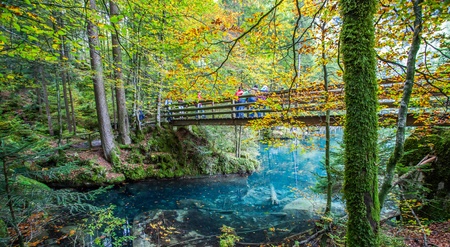 Blausee, Switzerland, October 6th, 2012. Tourists enjoying the view of the crystal clear lake at Blausee, Switzerland.のeditorial素材