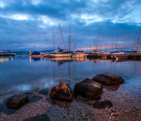 Sailboats at Lake Geneva at dawn の写真素材