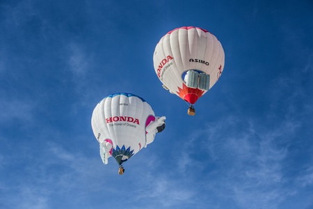 Chateau de Oex, Switzerland, 26th January 2013. Hot air balloons at the 35th International Hot Air Balloon festival. It is being held from 26th January to 3rd February 2013.のeditorial素材