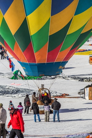 Chateau de Oex, Switzerland, 26th January 2013. Hot air balloons at the 35th International Hot Air Balloon festival. It is being held from 26th January to 3rd February 2013.のeditorial素材