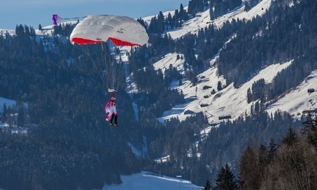 Chateau de Oex, Switzerland, 26th January 2013. Parachutists at the 35th International Hot Air Balloon festival. It is being held from 26th January to 3rd February 2013.のeditorial素材