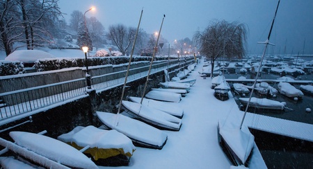 Morning snow in Nyon marina, Lake Geneva, Switzerland.の写真素材