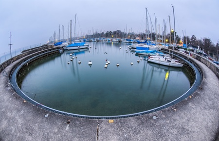 Sailboats at a marina at Lake Geneva, Switzerlandの写真素材
